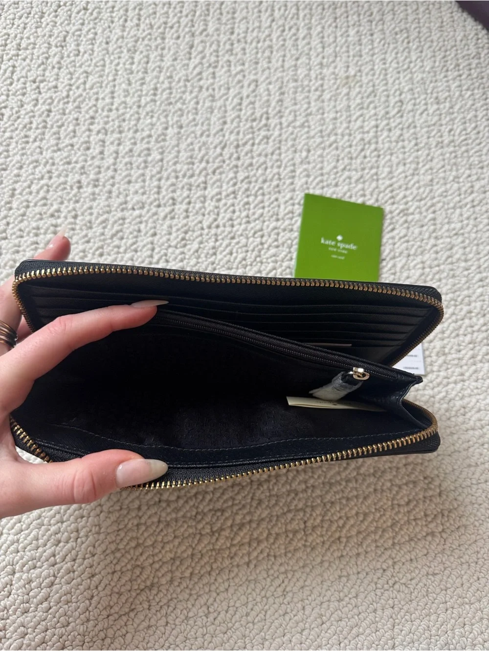 kate spade Black Zip-Around Continental Wallet with Gold Logo